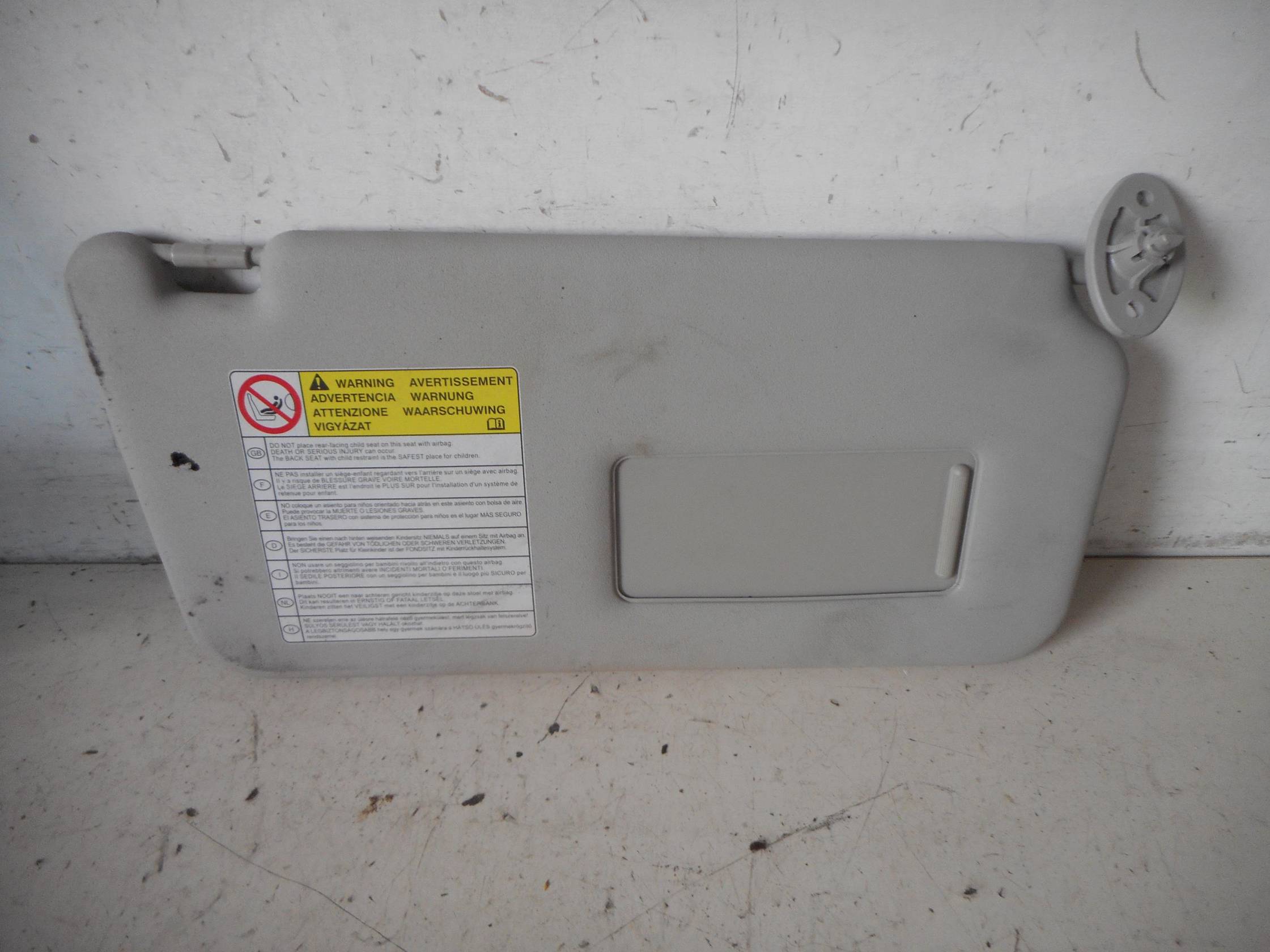 Aletta parasole parabrezza dx.